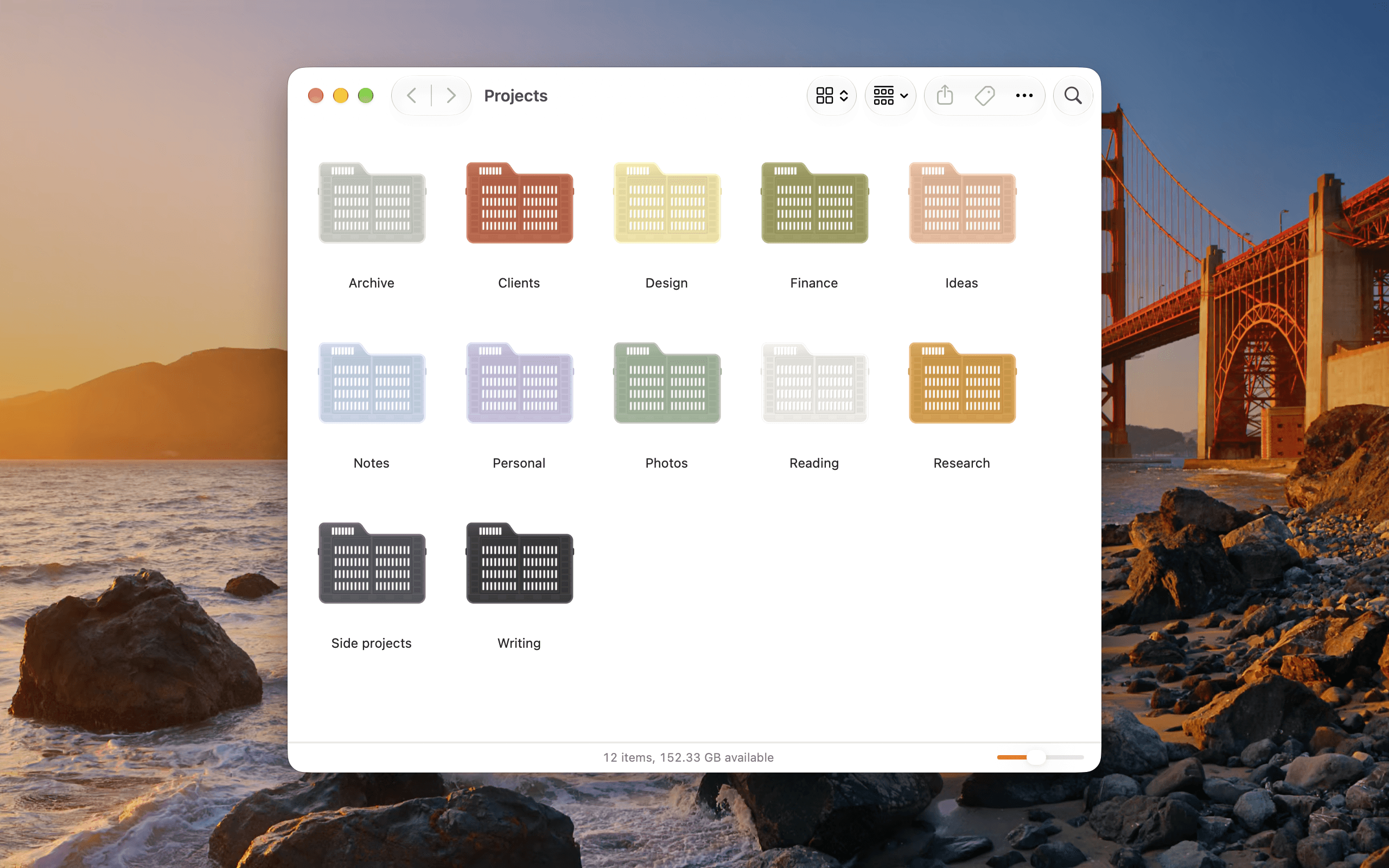 A Finder window of twelve folders, each a coloured crate
